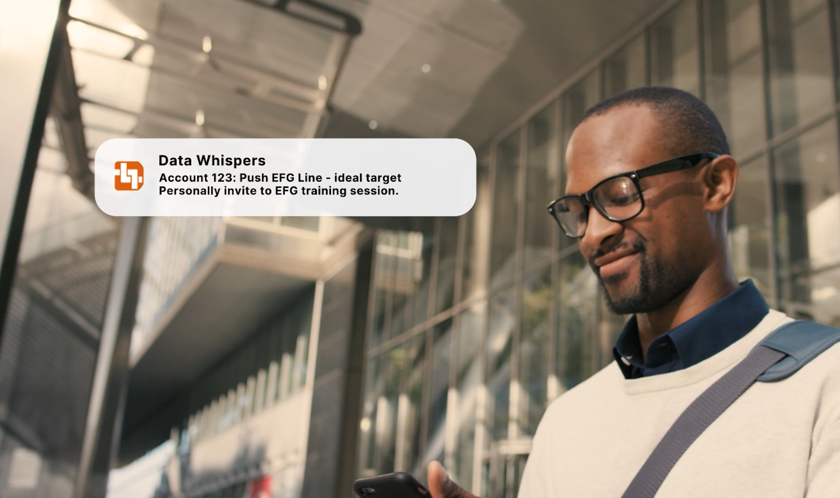 man standing outside airport with a data whisper alert in the corner
